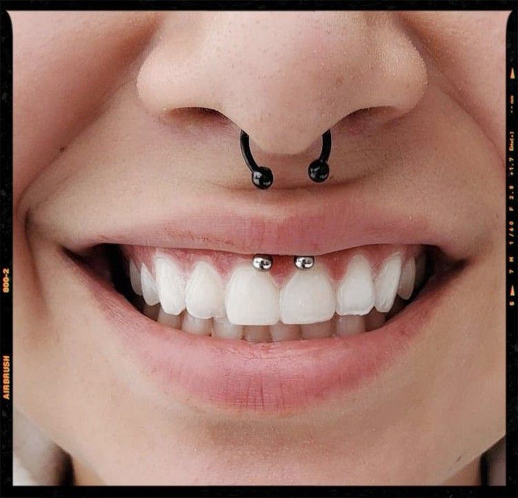 smiley piercing with nose ring